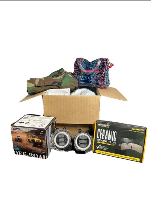 Box containing various items including a camouflage jacket, a box labeled 'Off-Road', and a 'Ceramic Paint' product on a white background.